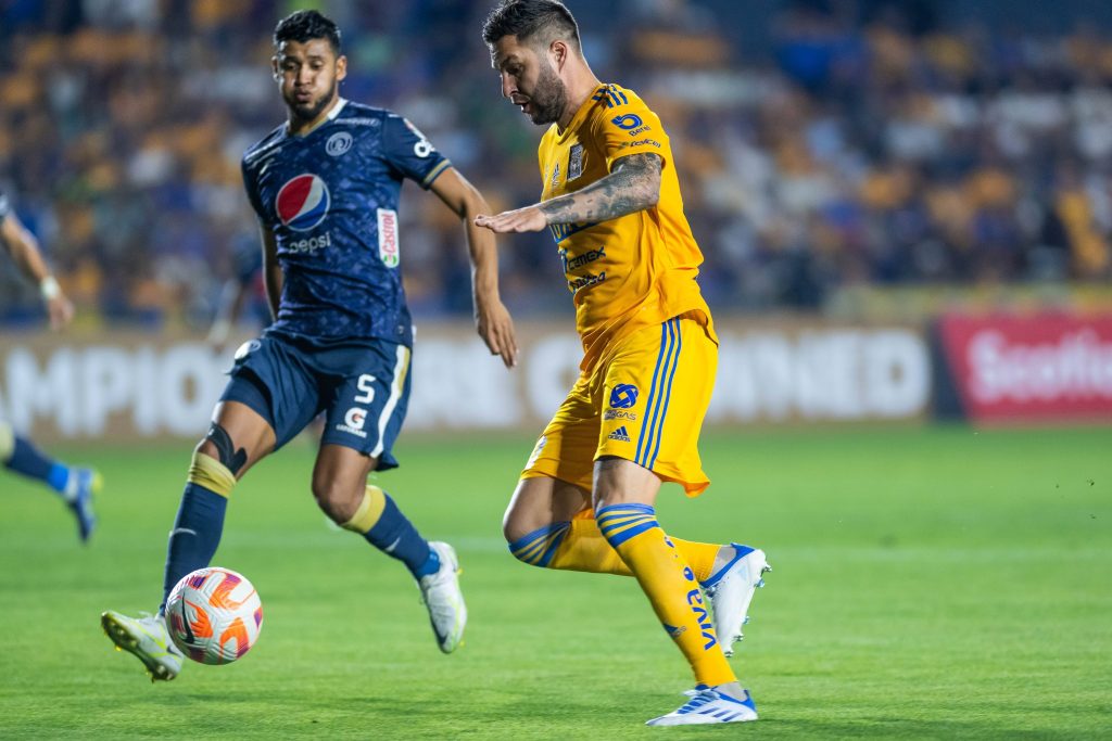 RECORD DATE NOT STATED (L-R), Marcelo Pereira of Motagua and Andre-Pierre Gignac of Tigres during the game Tigres UANL (