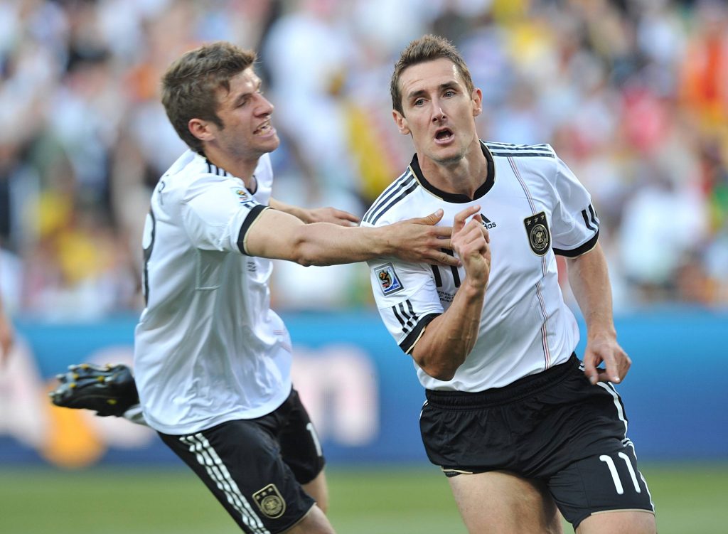 World Cup Numbers File Photos File photo dated 27-06-2010 of Germany s Miroslav Klose (right) celebrates with his team m